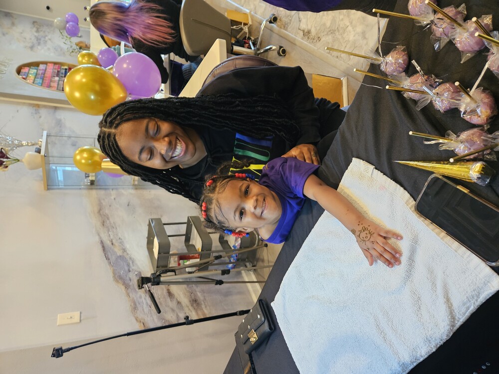 kid with hello kitty henna design at a children's party - U R Royalty Medical Spa - Cypress, Texas